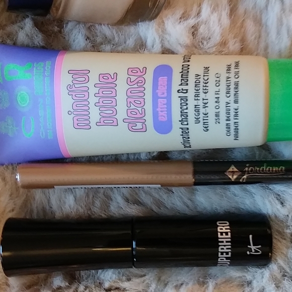 Gold Victoria's secret bag filled with a variety of beauty products. - Picture 12 of 13